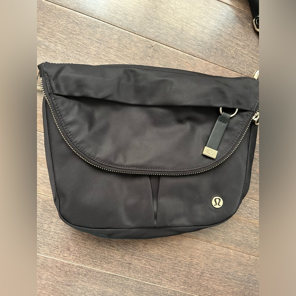 Lululemon all night festival bag 5L. Black with gold hardware.